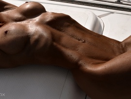 Nude tanned wet beauty (click to view)